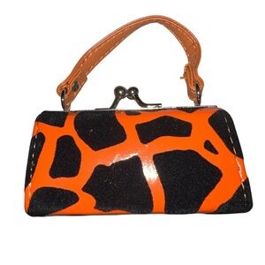 Stylish Orange and Black animal print mini Handbag lipstick holder!